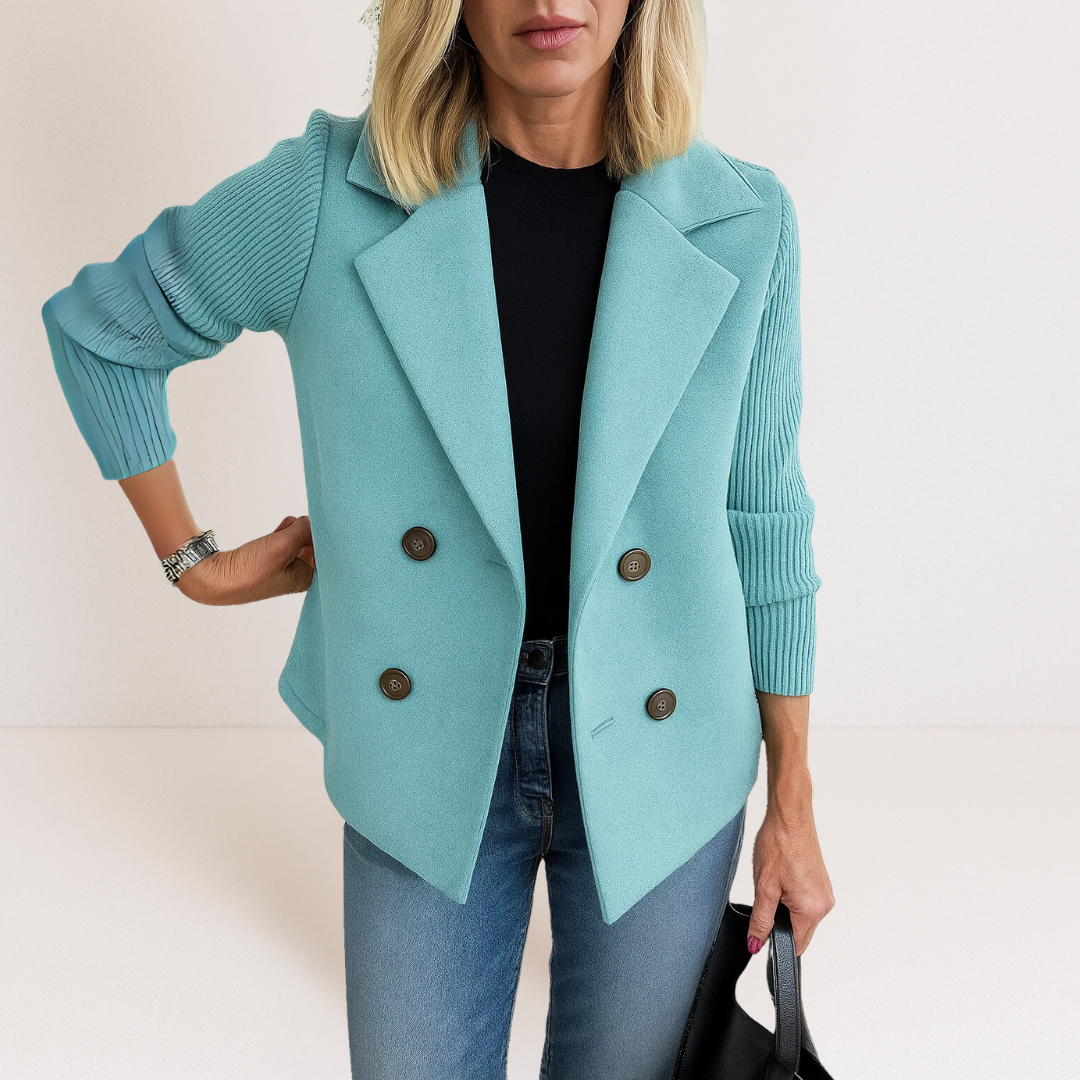 Light blue everyday blazer with notch lapels and four-button front, ribbed knit sleeves