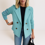 Light blue everyday blazer with notch lapels and four-button front, ribbed knit sleeves