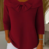 Red ribbed knit sweater with large bow collar and 3/4 sleeves