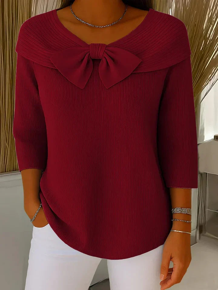 Burgundy women's knit sweater with oversized bow at neckline, 3/4 sleeves