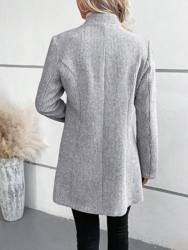 Grey collarless long-sleeve overcoat with herringbone texture, back view