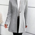 Grey collarless long-sleeve overcoat with herringbone weave and single-button front