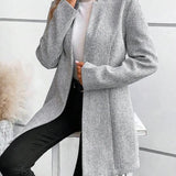Grey collarless long-sleeve overcoat with structured front and button closure