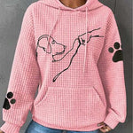 Women’s pink pullover hoodie with hood and pouch pocket, dog graphic, paw-print sleeves