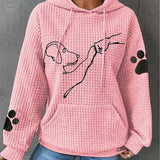 Women’s pink pullover hoodie with hood and pouch pocket, dog graphic, paw-print sleeves