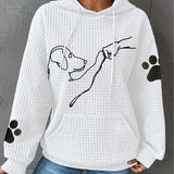 Women’s white pullover hoodie with hood and pouch pocket, dog graphic, paw-print sleeves
