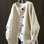 Beige cable-knit cardigan with button front and ribbed trim