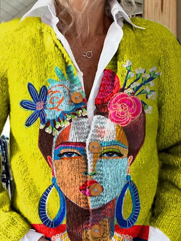 Yellow V-neck cardigan with multicolor face portrait print and white ruffle-trim collar