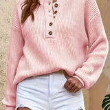 Pink knit pullover henley sweater with button-front placket and long sleeves