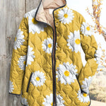 Women’s yellow quilted jacket with white daisy pattern, button front and hood
