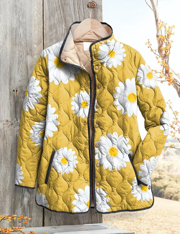 Women’s yellow quilted jacket with white daisy pattern, button front and hood