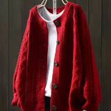 Red cable-knit cardigan with button front and ribbed cuffs