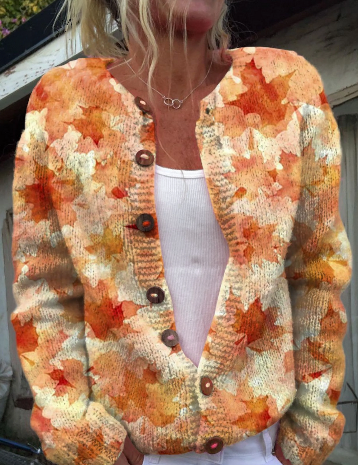 Multicolor knit cardigan with dark button front, V-neck, and long sleeves