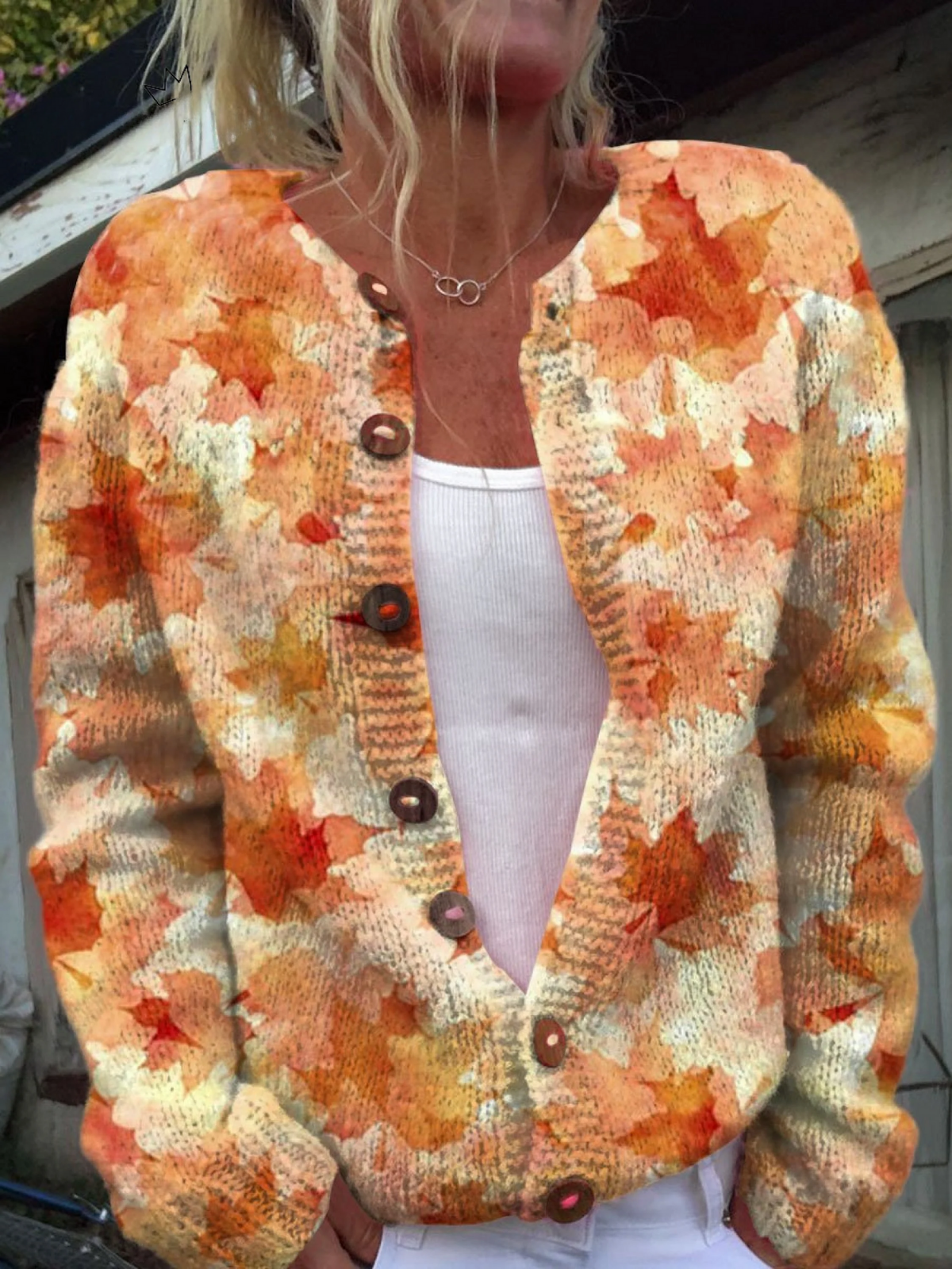 Multicolor knit cardigan with dark button front, V-neck, and long sleeves