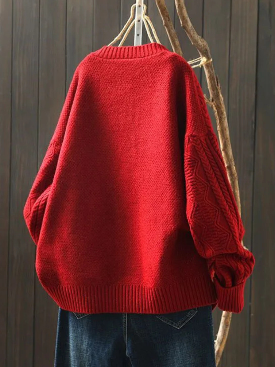 Red cable-knit sweater-cardigan with ribbed hem and cuffs