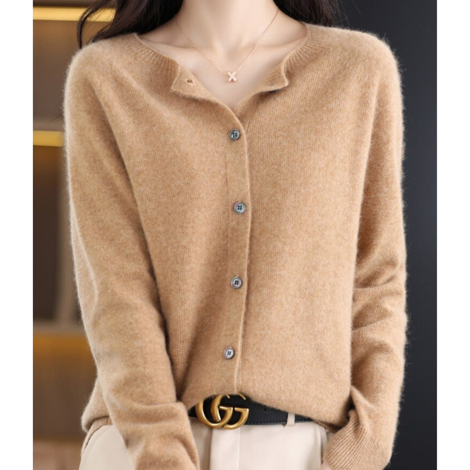 Beige knit pullover with button-front V-neck and long sleeves