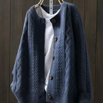 Navy cable-knit cardigan with button placket and ribbed neckline