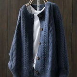 Navy cable-knit cardigan with button placket and ribbed neckline