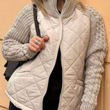 Beige quilted cardigan vest with long knit sleeves and front zipper