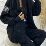 Plush hooded jacket, black, front button closure with relaxed fit hood
