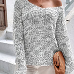 Loose knit pullover sweater with long sleeves, medium heather gray speckled knit