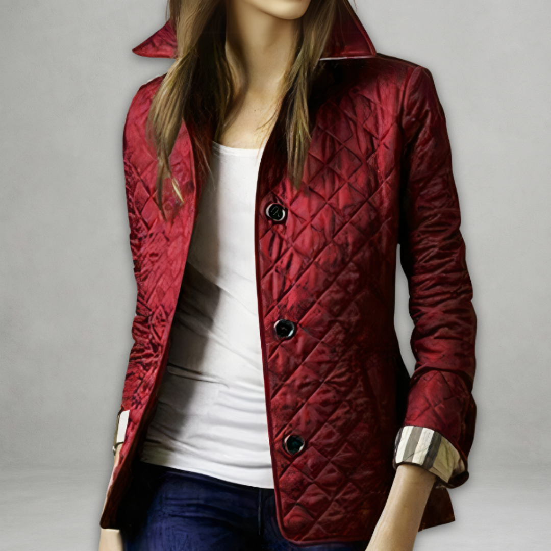 Burgundy quilted fall jacket with button front, stand collar, and side pockets