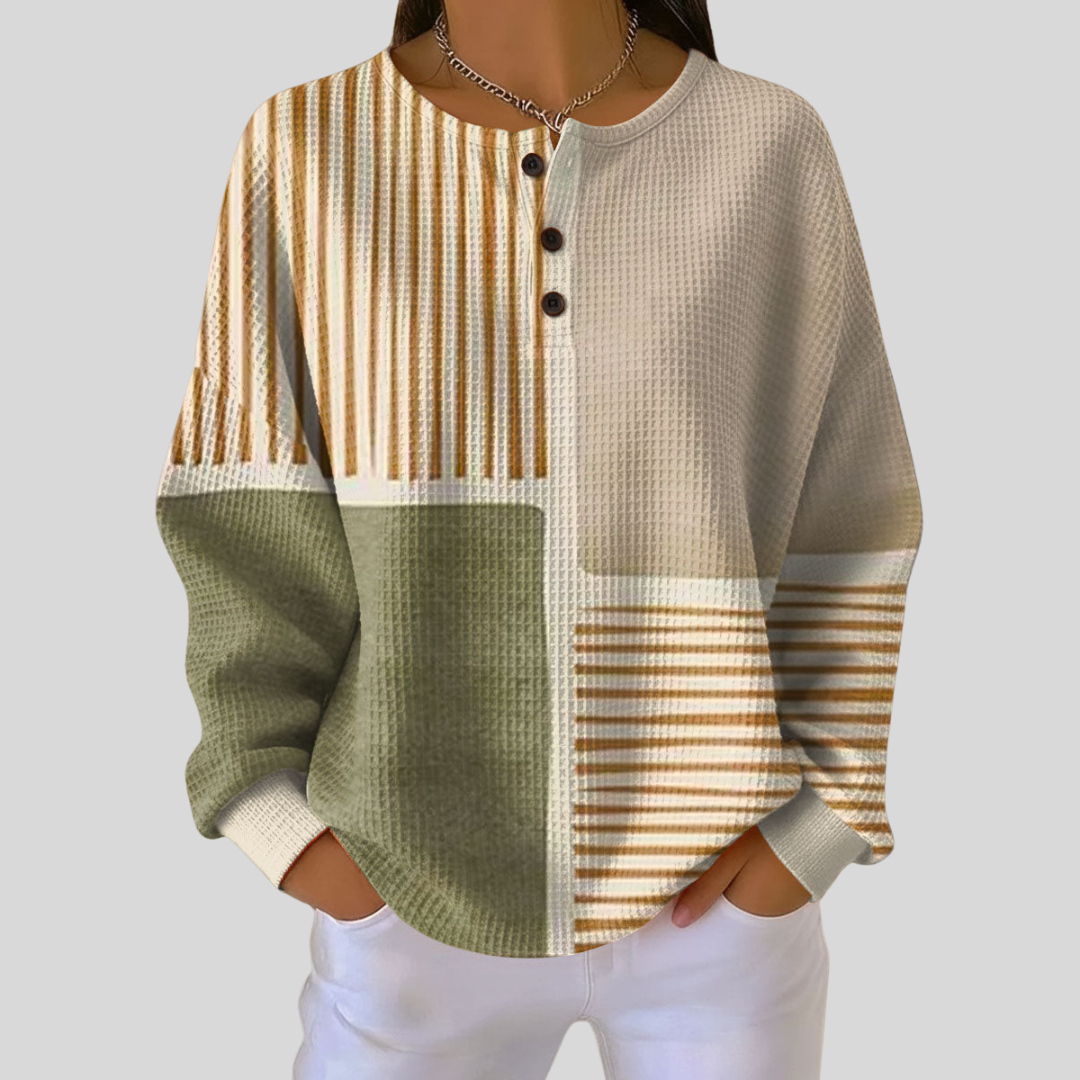 Multicolor patchwork henley shirt with black button placket and long sleeves
