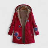 Red hooded parka jacket with abstract circular print, front zipper, warm lined hood.