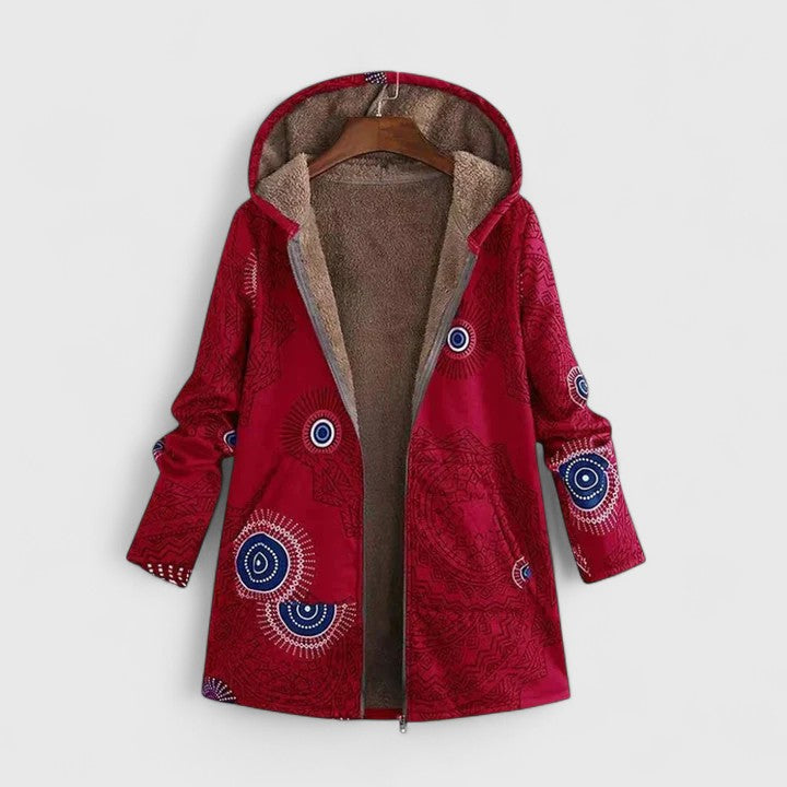 Red hooded parka jacket with abstract circular print, front zipper, warm lined hood.
