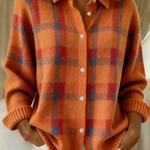 Orange plaid button-front cardigan sweater with collared neckline and long sleeves