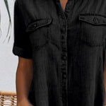 Black denim shirt dress front detail with button placket and chest pockets