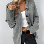 Gray hooded knit cardigan with button front, ribbed cuffs, and cozy hood