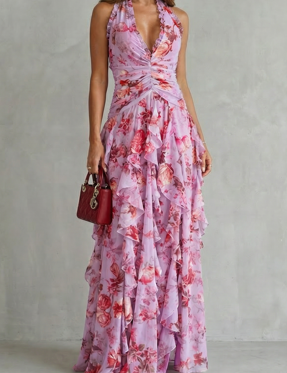 Pink floral halter maxi dress with draped bodice and tiered ruffle skirt