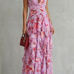 Pink floral halter maxi dress with draped bodice and tiered ruffle skirt