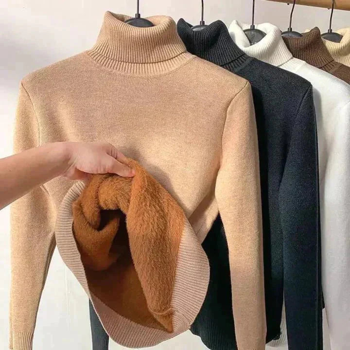 Beige fleece-lined turtleneck sweater with ribbed cuffs and hem detail