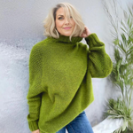 Women’s green rollneck sweater with long sleeves and ribbed cuffs