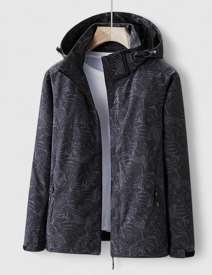 Dark hooded jacket with front zipper and stand collar, leaf-patterned fabric