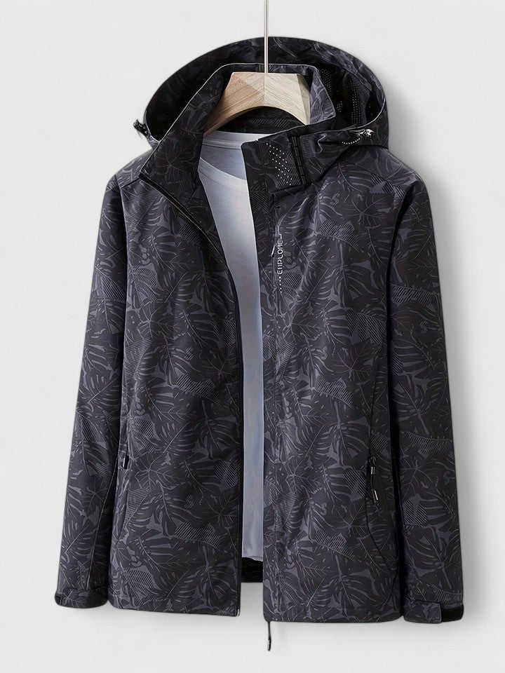 Dark hooded jacket with front zipper and stand collar, leaf-patterned fabric