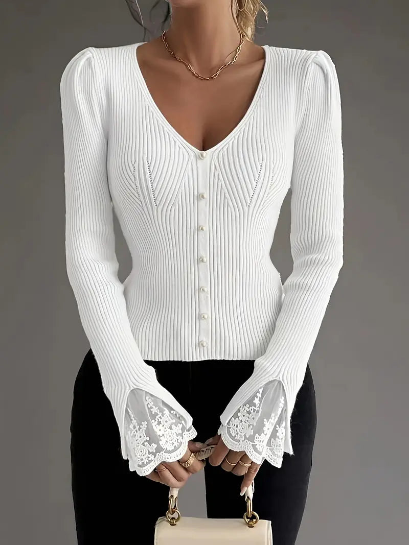 White ribbed V-neck button top with lace-trim bell cuffs