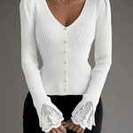 White ribbed V-neck button top with lace-trim bell cuffs