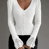 White ribbed V-neck button top with lace-trim bell cuffs
