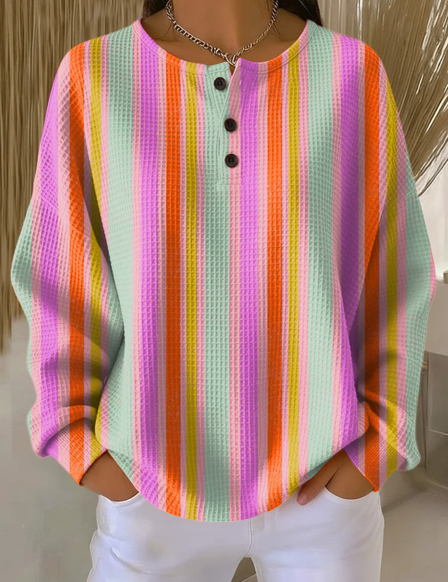 Rainbow vertical striped pullover henley with three black button placket