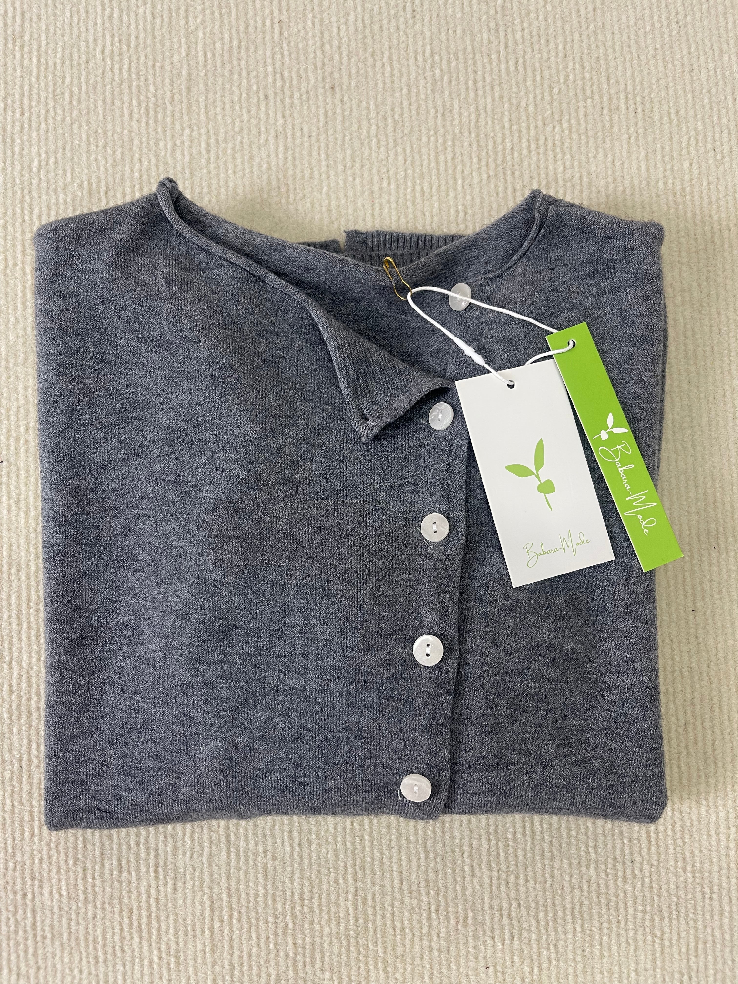 Folded grey heather knit pullover with V-neck, long sleeves, button front
