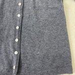 Grey heather knit pullover front with button placket and ribbed hem