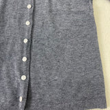 Grey heather knit pullover front with button placket and ribbed hem