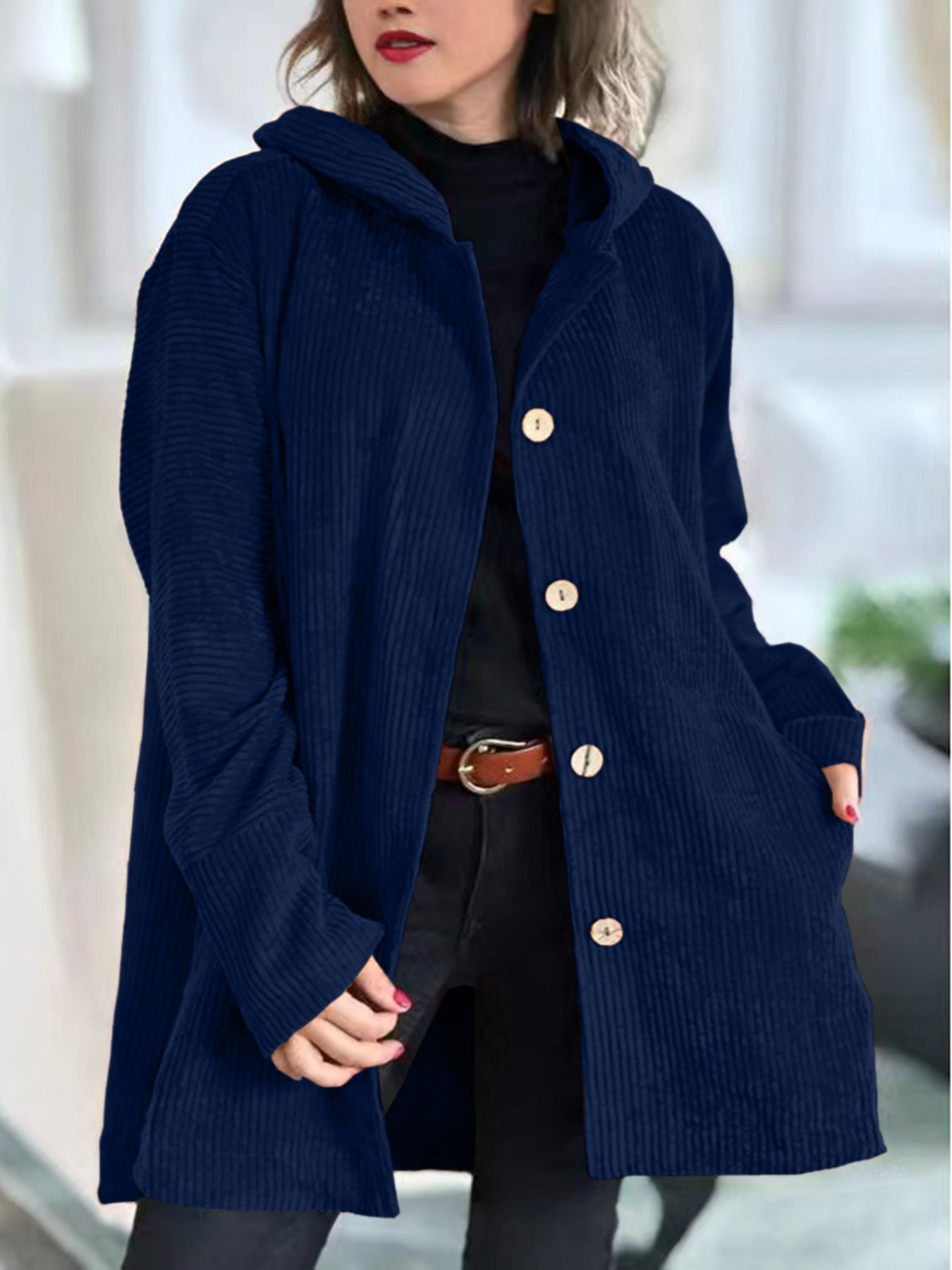 Navy corduroy hooded jacket with button front and side pockets