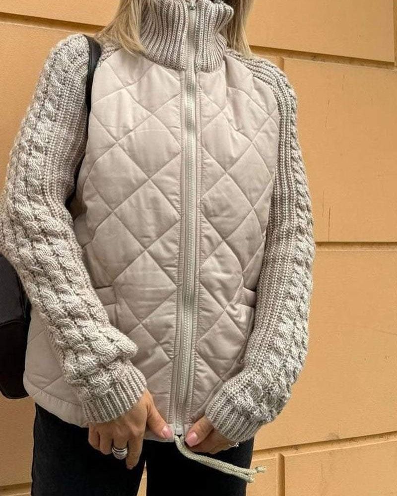 Beige quilted cardigan vest with front zipper and gray knit sleeve cuffs