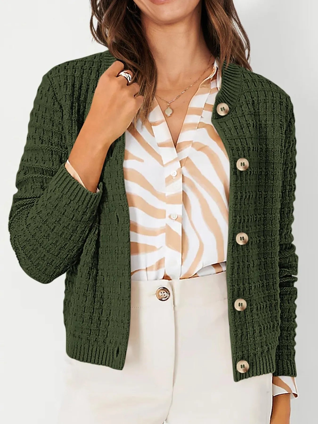 Womens knit cardigan with button front, dark green textured stitch and long sleeves