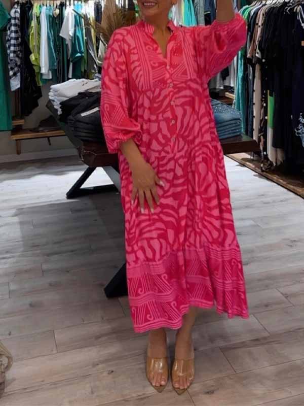 Pink printed V-neck midi dress with 3/4 sleeves, button front, tiered hem