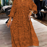 Orange printed V-neck midi dress with 3/4 sleeves and button front